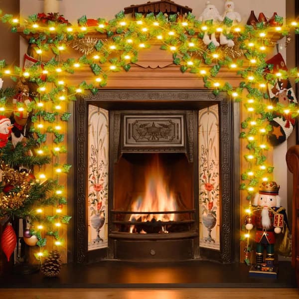 A Screen Decorated With Lights And Greens