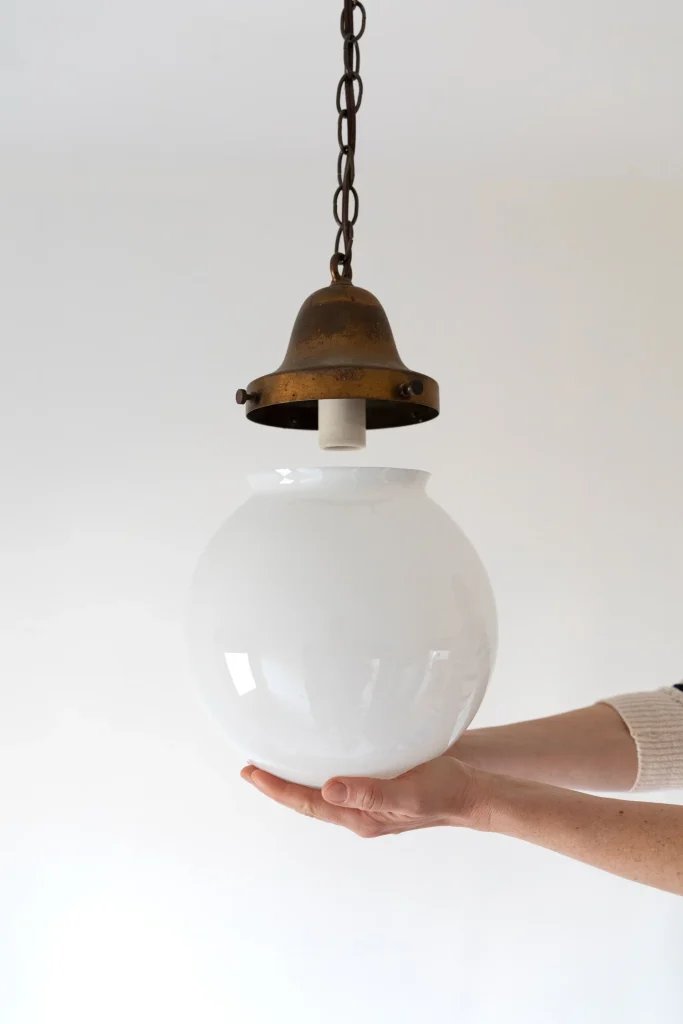 What is the Glass Decorative Piece Covering a Light Called